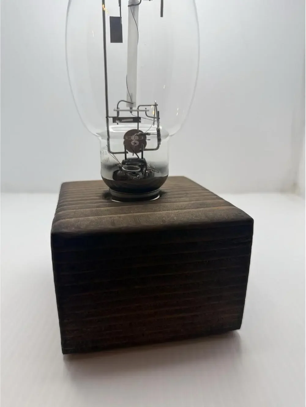 Vintage Retro High Pressure Sodium Industrial Bulb Display on Wood Pedestal